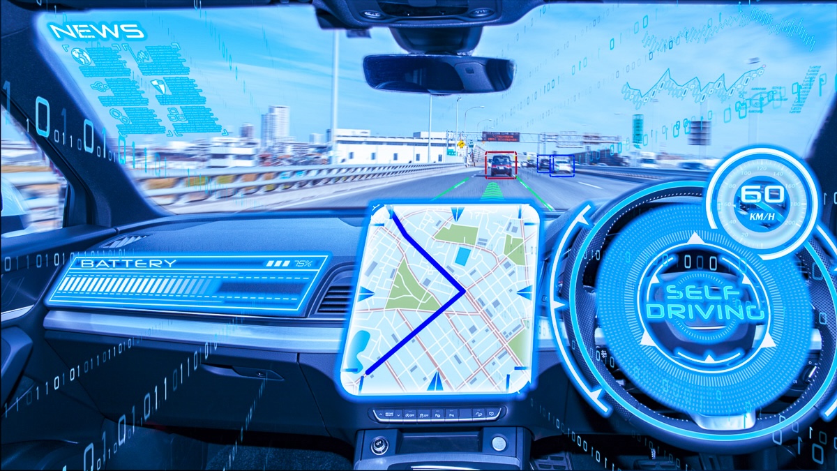 Self driving car with head up display on a road showing mapping and tracking capabilities